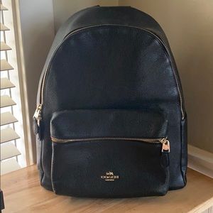 Coach black leather jacket pack